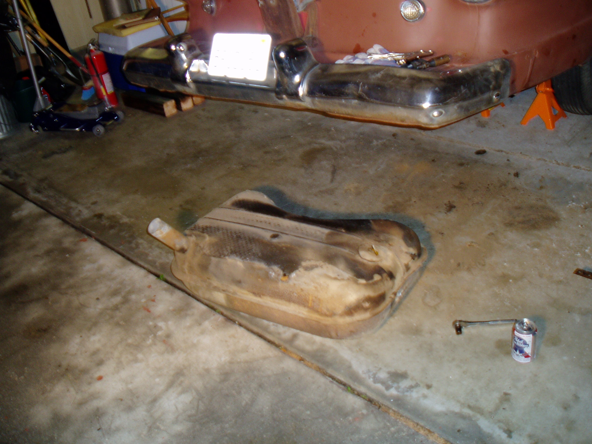 Gas tank removed. It leaks when full, so I need to clean it up and re-seal it.