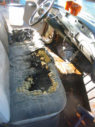 The front seat was kinda wasted after the fire.