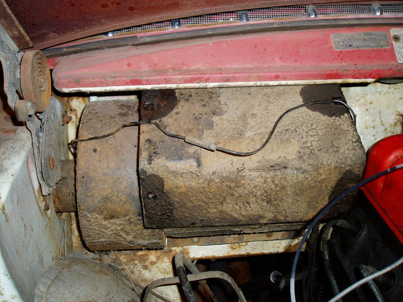 This ugly lump is the Nash "Weather Eye" heater box. It's useless and it's in the way of getting to the leaking freeze