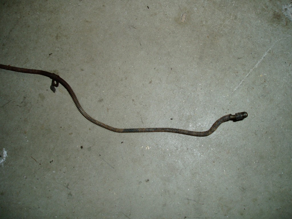 Rear brake hose, rusted.