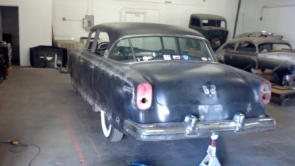 Rear continental kit & backup light holes filled, rust repaired.