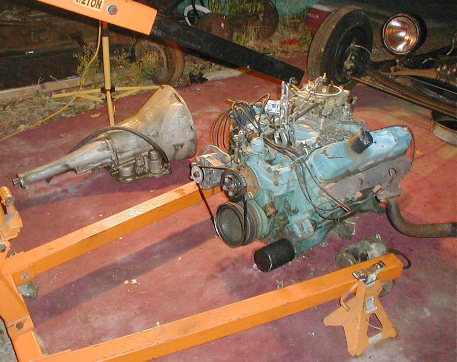 Motor and trans out. Since the body was welded to the frame after I had the motor and trans already installed, I wasn't sure how