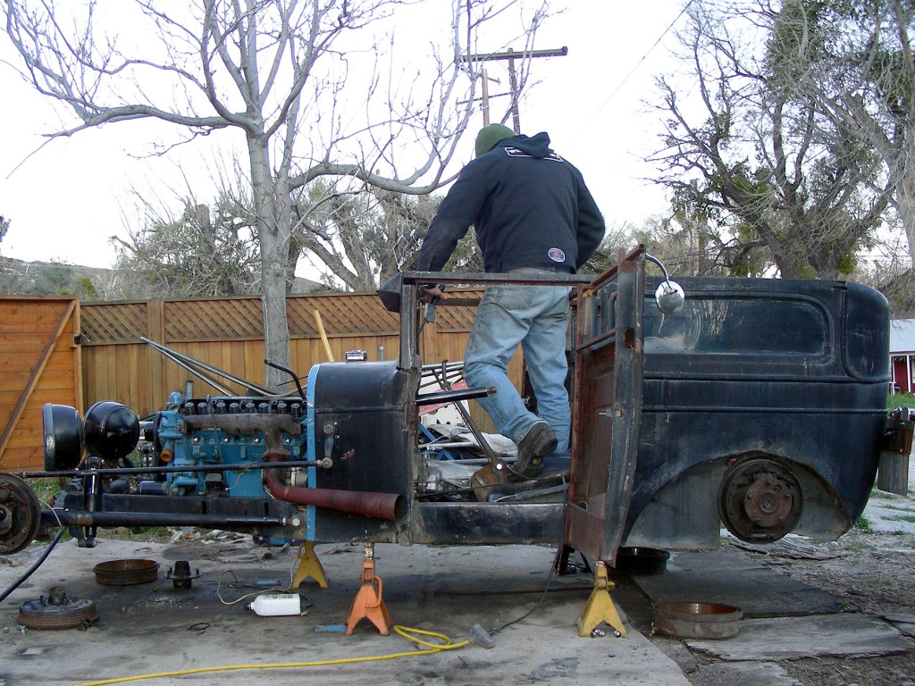 The replacement roof will be an aluminum sheet with some aluminum stringers. The old roof attaching points are to be removed.