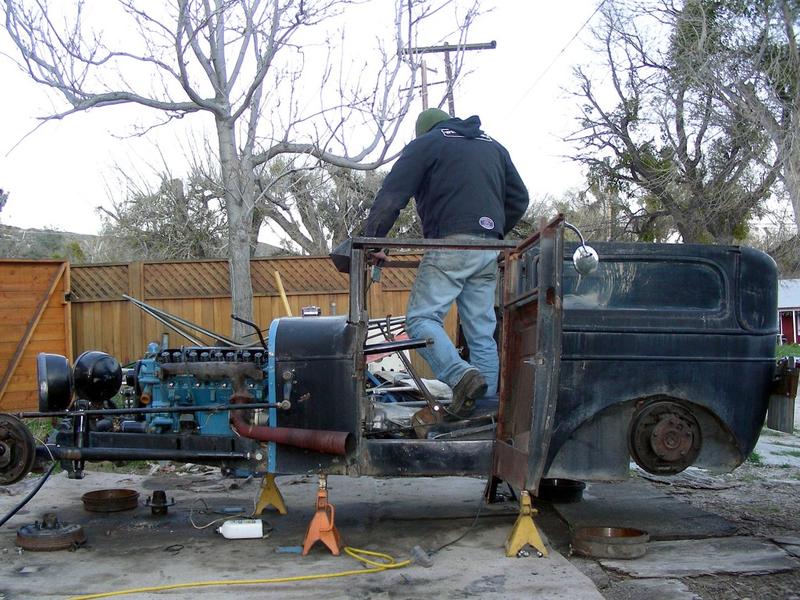 The replacement roof will be an aluminum sheet with some aluminum stringers. The old roof attaching points are to be removed.