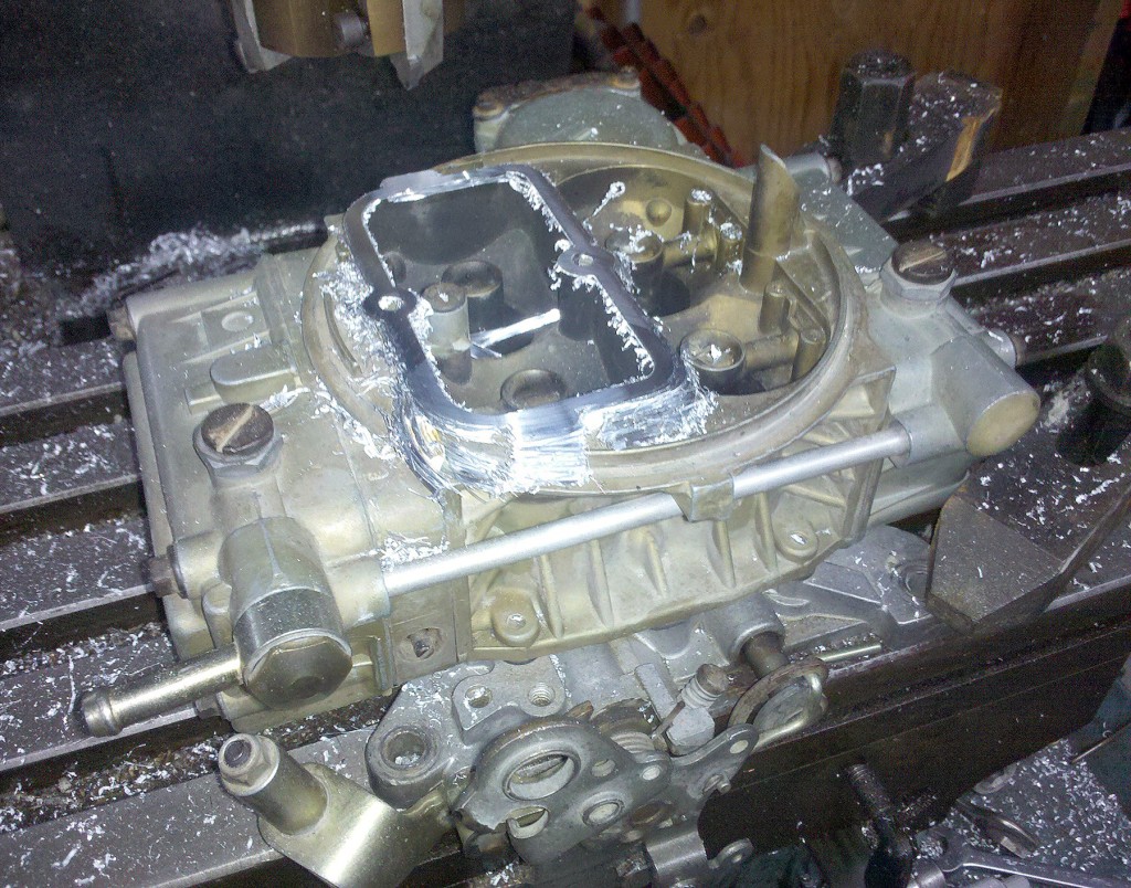 Choke horn removal in preparation for some new lower profile intake scoops.