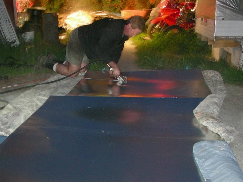 Near sheet is new roof. Far sheet is roof stiffeners. Middle sheet is scrap with a dent in it from our parking lot wrestling mat