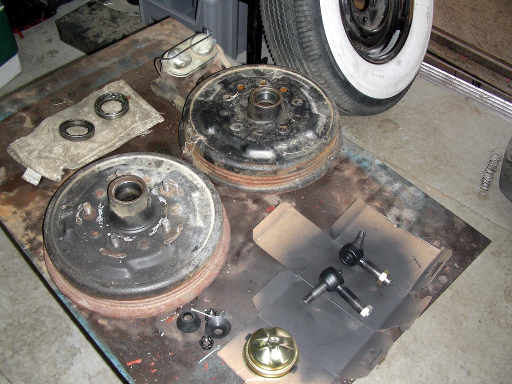 Hubs are prepped. Master and new tie rod assembly is painted. Stick-on wheel weights installed to clear Moons.