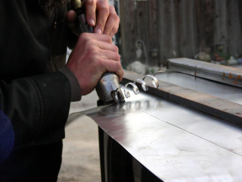 Air-shear everything rough. Straightening will happen by hand with a coarse file later.