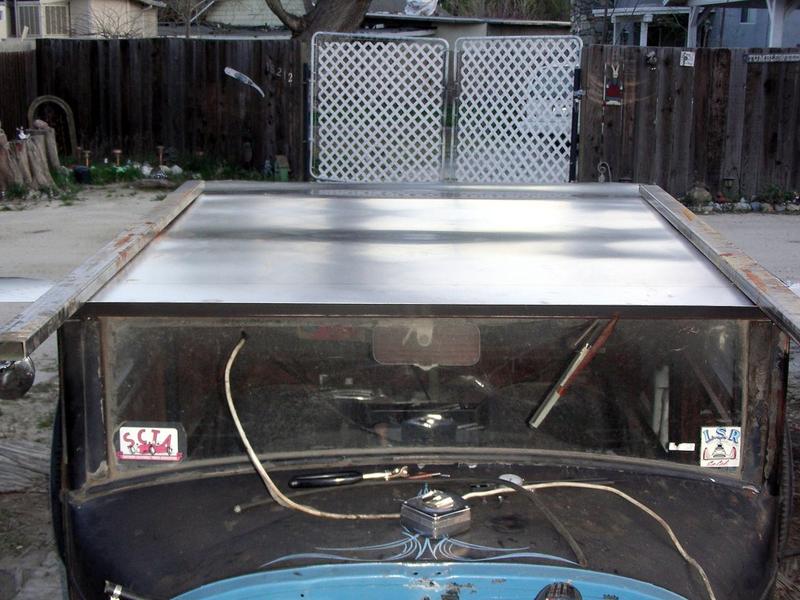 All sides of the sheet now trimmed to basic size. Material on the front corners is for the integrated visor.