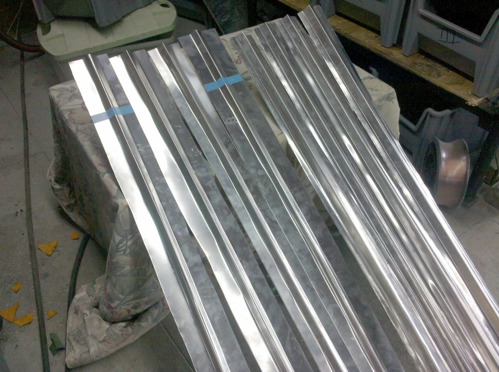 Thanks to GV Bob for forming a set of stringers for me (left). ...but I wanted tighter radii. So I made another set (right).