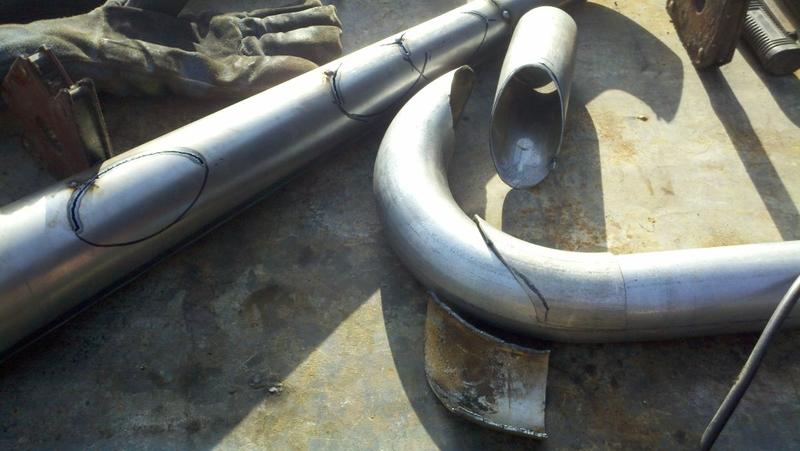 Templates for cutting scallops in zoomies.
Finished zoomie.
Megaphone half plasma-cut for zoomie interface areas.