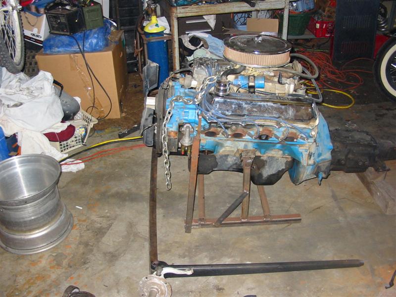 Ford 460, .030 over, TRW pistons, Comp cam, Edelbrock Performer intake, Holley carb with a 4 speed top-loader on the back.