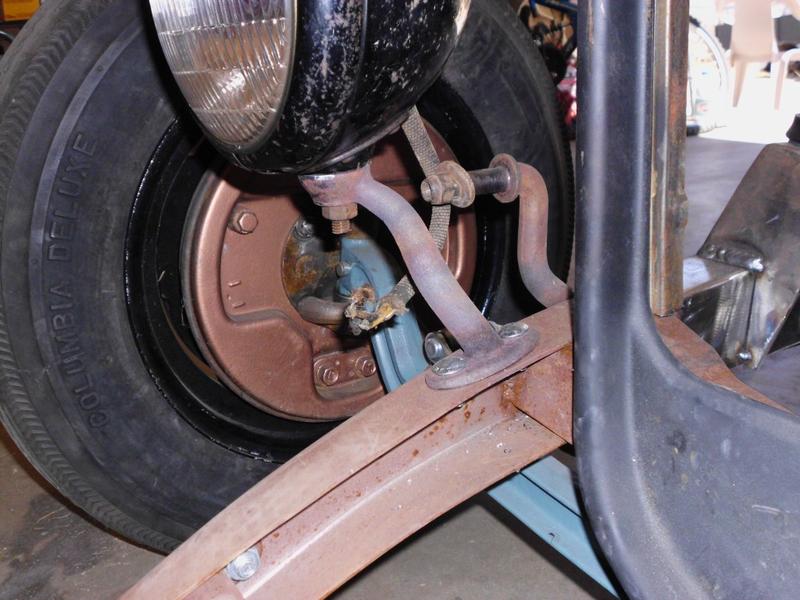 cut and bent an old headlight bar  to mount lights