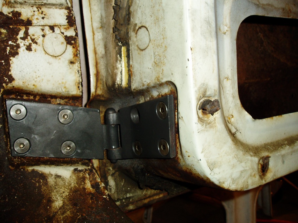 3-14-2007. New hinges in place (top & bottom)