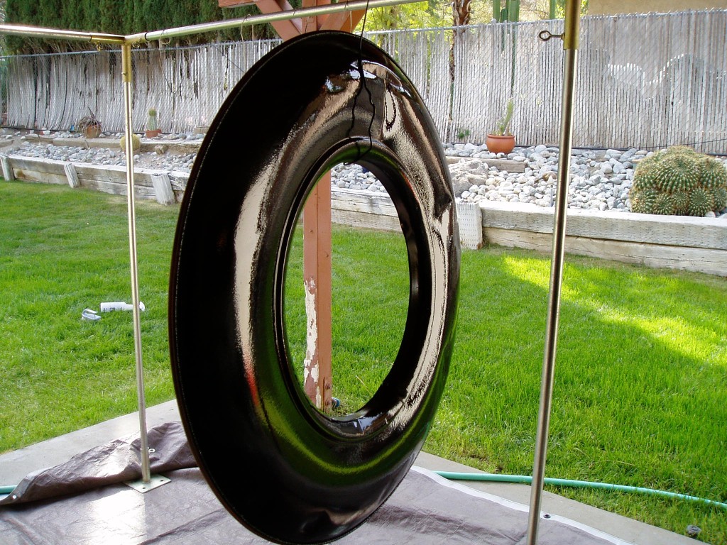 HVLP sprayer tested on the old continental kit cover. Rustoleum Satin Black.