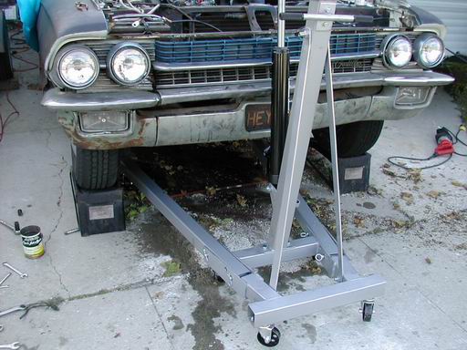 Another oil slick in my driveway.
The Caddy, VW's and Harleys. At least the Jeep doesn't leak. Oops, does now.