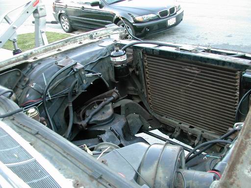 Wooo! An empty hole. The Chevy 383 and T350 went in without too much problem, and drove to VLV6 a few days later.
Watch for pic