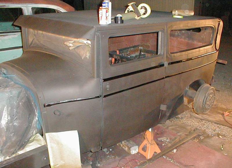 Who put gloss and masking material on my car?!