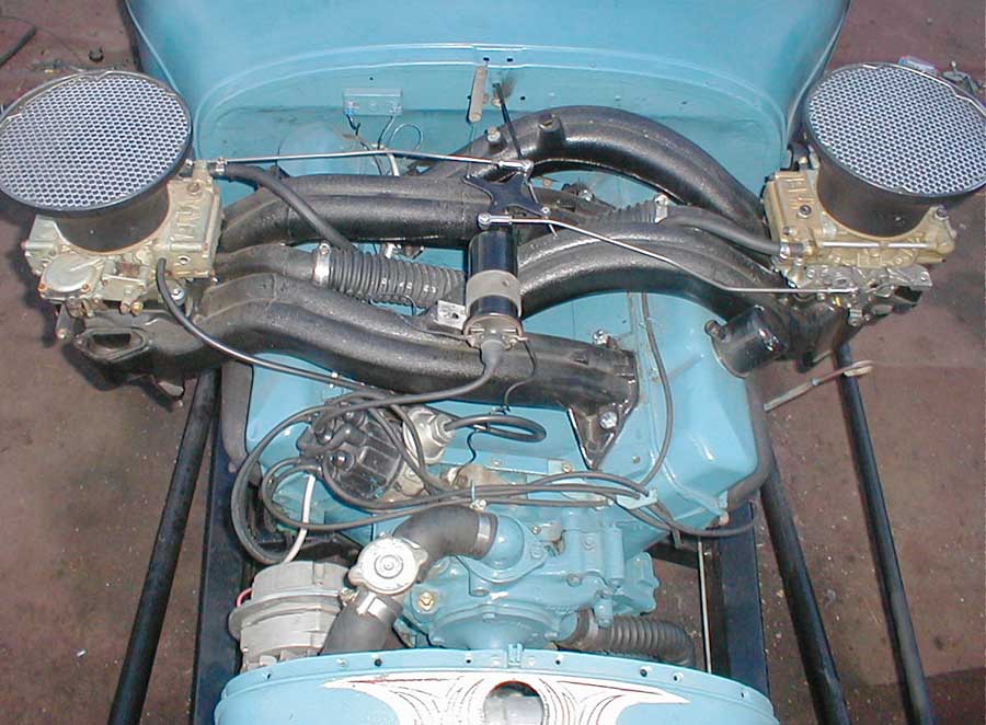 A nice resurrection of all our pain and frustration last year. The radiator plenum hose is temporary until something else can be