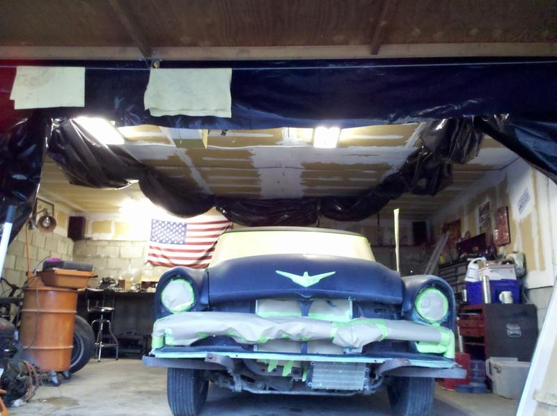 Car stripped of chrome, bumpers, and taped up. Time to do work! 