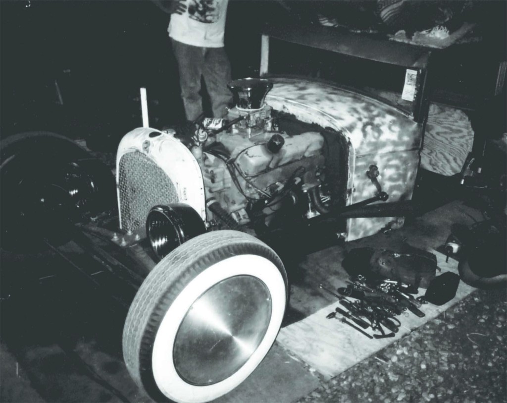 I was busy tying the Diest belts to the plywood floor so the car would at least ~look~ safe. Jim Diest would have put his cigar 