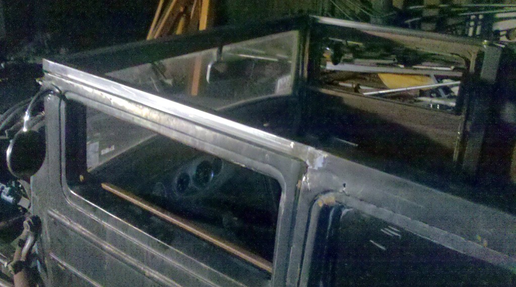 Years of being sat on bent the somewhat skinny top rails above the doors. I don't want to put a new roof on bent rails, so they'