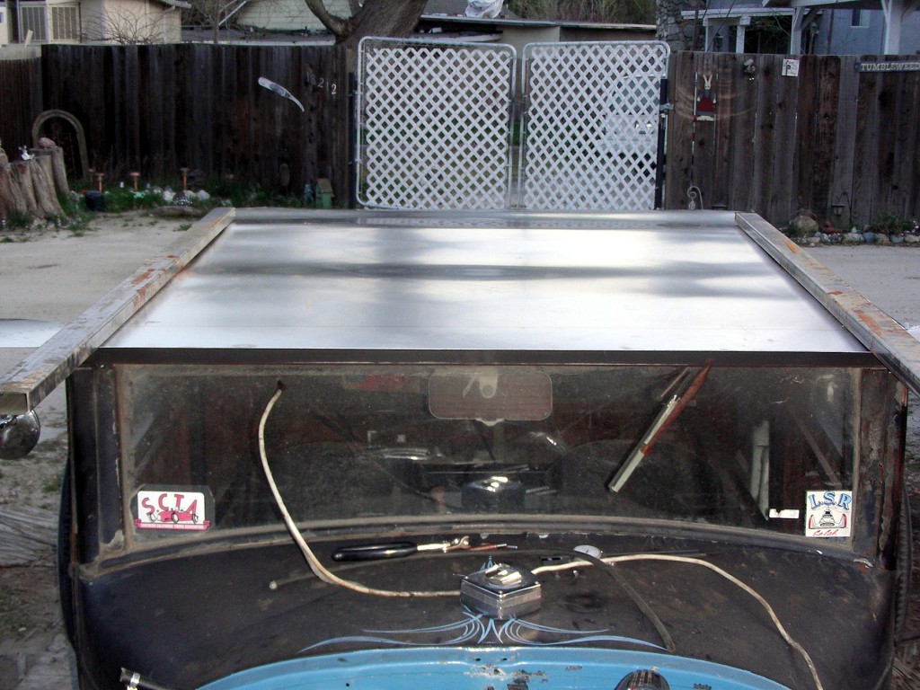 All sides of the sheet now trimmed to basic size. Material on the front corners is for the integrated visor.