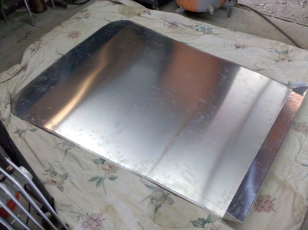 Last time off the car. Holes deburred. Edge pinch more visible in this shot.