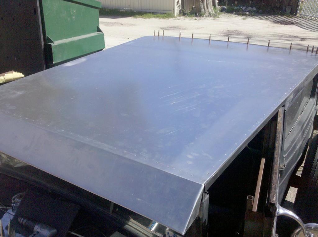 Front and side rivets complete. I need to wait for Ita to get home so she can help me buck the ones in the back.