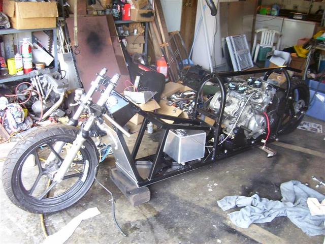 Engine mounted, fuel tank mounted.