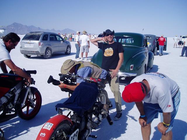 Uninvited photographer gets a special welcome from crew chief Mikey.