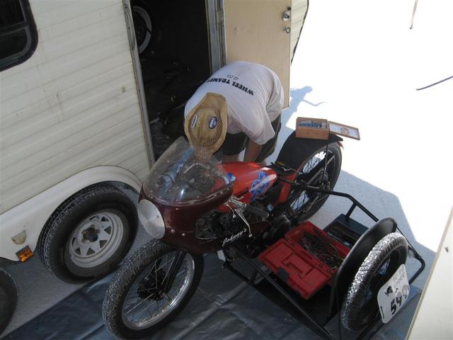 Working on the bike in impound after qualifying on Sunday.