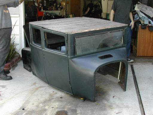 The body as I got it. The chop was started, but they just tack welded the whole thing together to keep it in one piece.