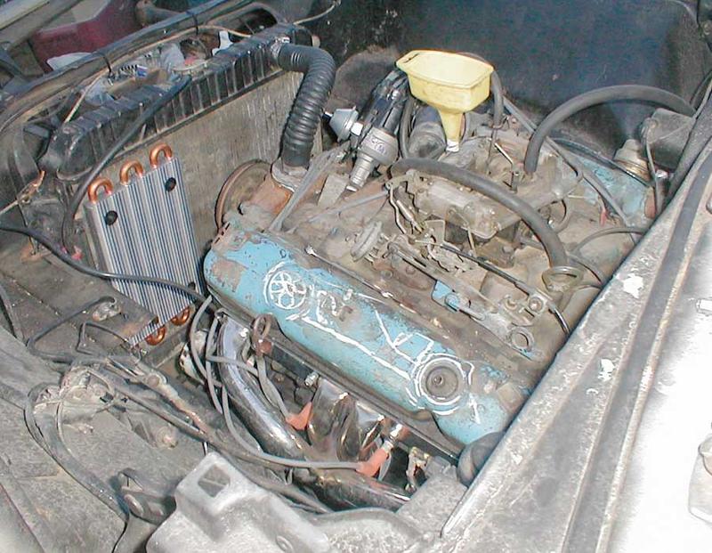 New distributor, fuel line, throttle linkage, radiator installation, trans cooler. Electric fan on the front coming soon.