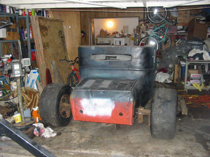 From the rear. 12" wide slicks will work nice.