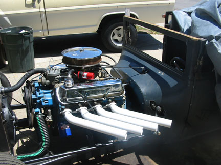 Then a nice coat of paint. Note the dipstick coming through the pipes and the clearance for the steering box. 