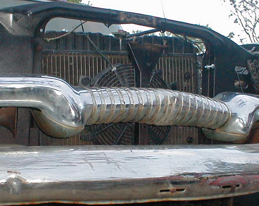 Radiator and fan are in. GAM is one used tire away from a drive.