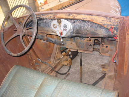 Has original dash gas tank, doesn't leak. Also, if the brakes fail, I can use the Flintstone's method of stopping.