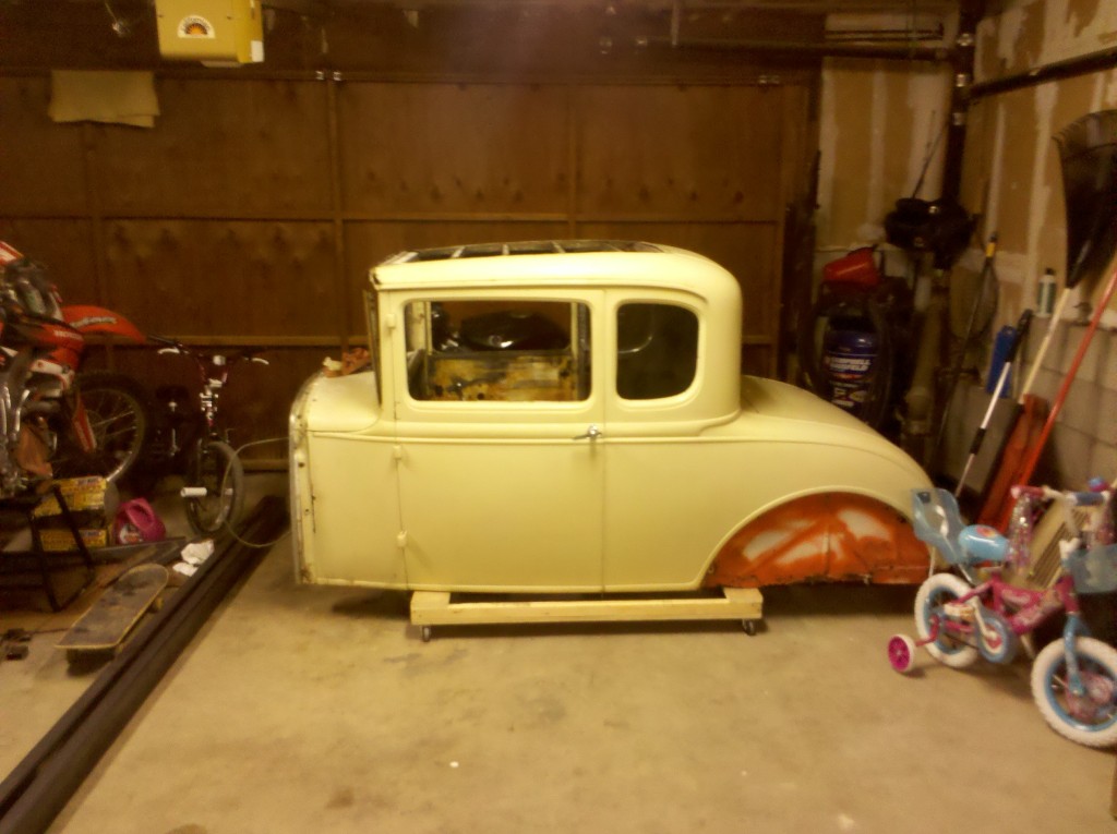 Car on newly built body dolly for easy maneuverability 