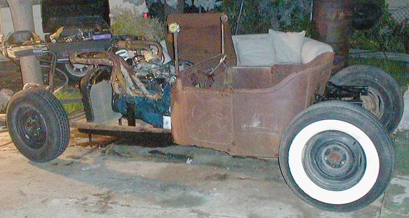 Brake components installed and front end rolled into position.
It's lookin' like wheelbase is gonna end up at around 102".